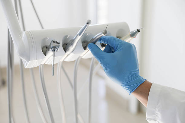Professional Tooth Extraction technician working in Galveston County County, TX